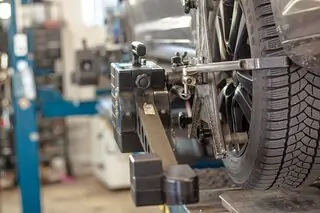 tyre being measured in workshop