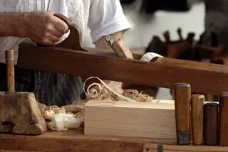 self employed carpenter using a lathe